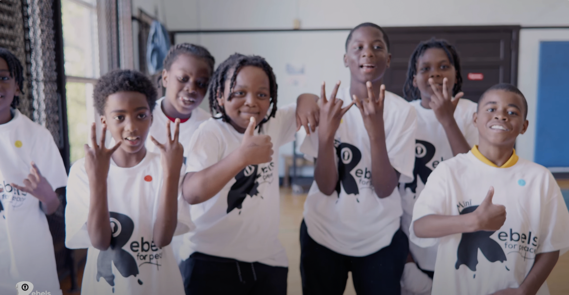 Rebels for Peace youth standing together